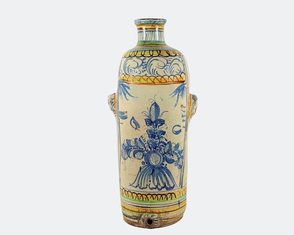Large amphora in majolica and glazed terracotta with decorations painted under paint with motifs of intertwining flowers and leaves