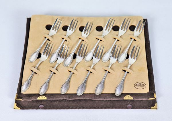 Lot of twelve silver forks with chiseled handles with Empire motifs gr. 180