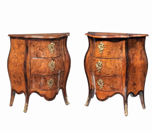 Two small rounded shaped drawers in walnut, purple ebony and rosewood