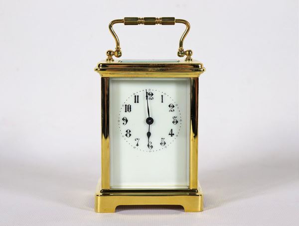 French travel capuchin in golden metal with white enamel dial