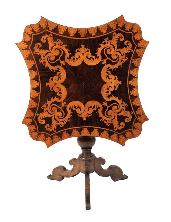 Antique "flag" center table in rosewood with curved square top inlaid with scrolls of acanthus leaves and palmettes