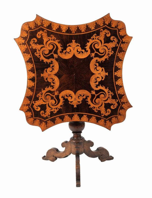Antique "flag" center table in rosewood with curved square top inlaid with scrolls of acanthus leaves and palmettes
