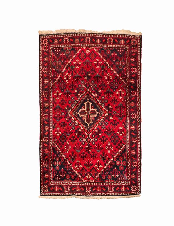 Persian Shirvan carpet with geometric motifs on a red background 2.14 x 1.35 m
