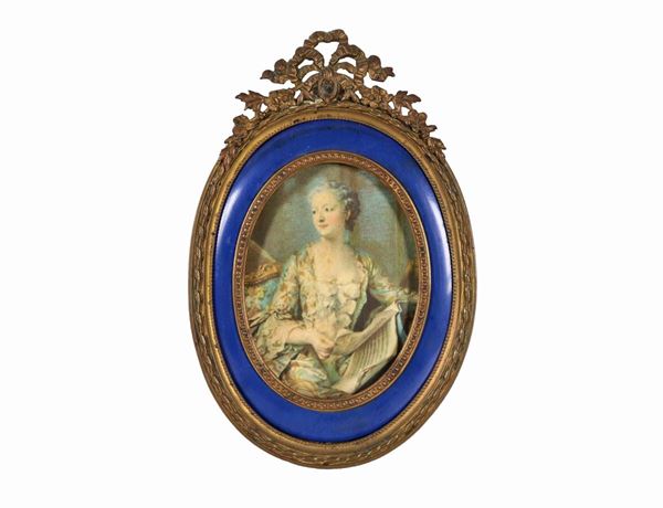 Ancient small miniature with oval mold "Dama" in a frame in gilded and chiseled bronze