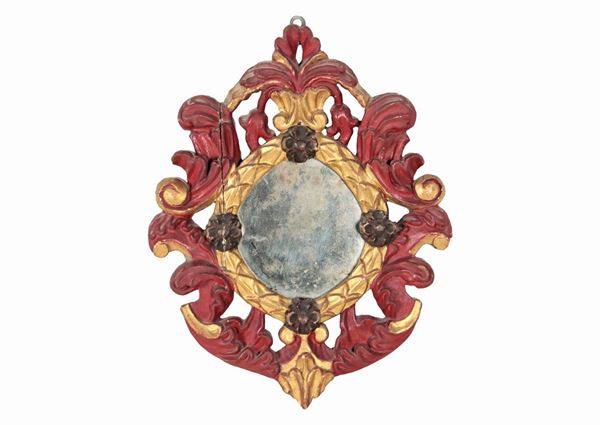 Red and gilded lacquered wood mirror with Louis XV motifs carvings, mercury mirror