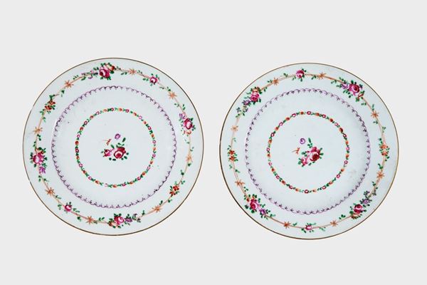Pair of wall plates in enamelled majolica from Pesaro