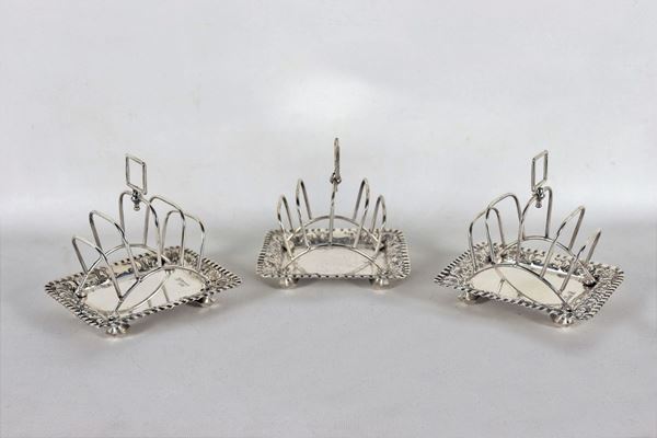 Lot of three chiseled and embossed English sheffield port holders