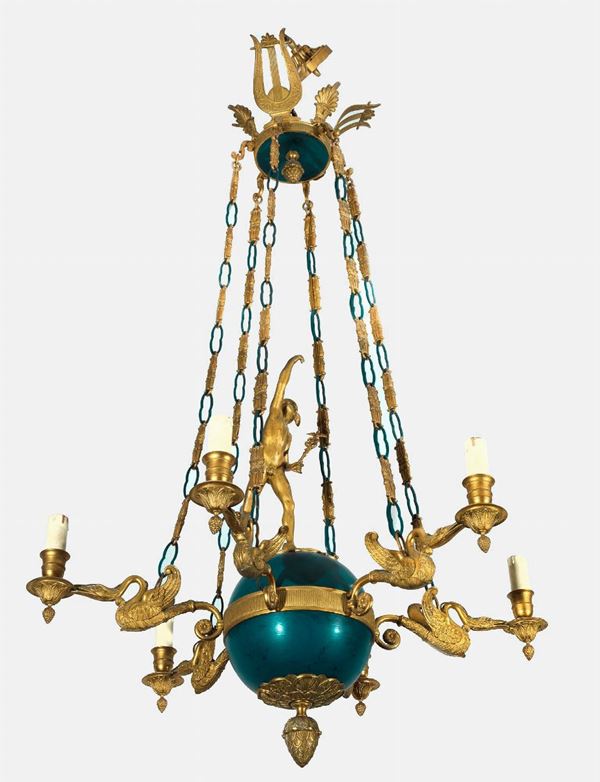 French chandelier in gilded and chiseled bronze of the Empire line with a sculpture of Mercury in the center  - Auction FINE ART TIMED AUCTION and Furniture of Casale in Maremma and Private Collections. - Gelardini Aste Casa d'Aste Roma