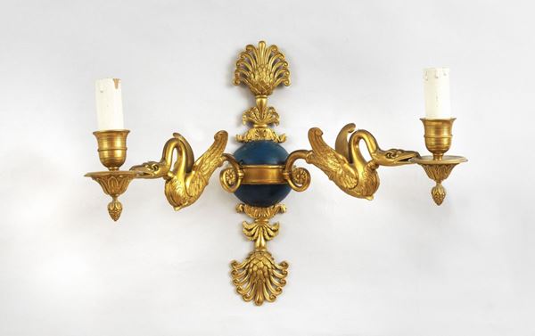 French applique in gilded bronze, chiseled and embossed with Empire motifs, 2 lights