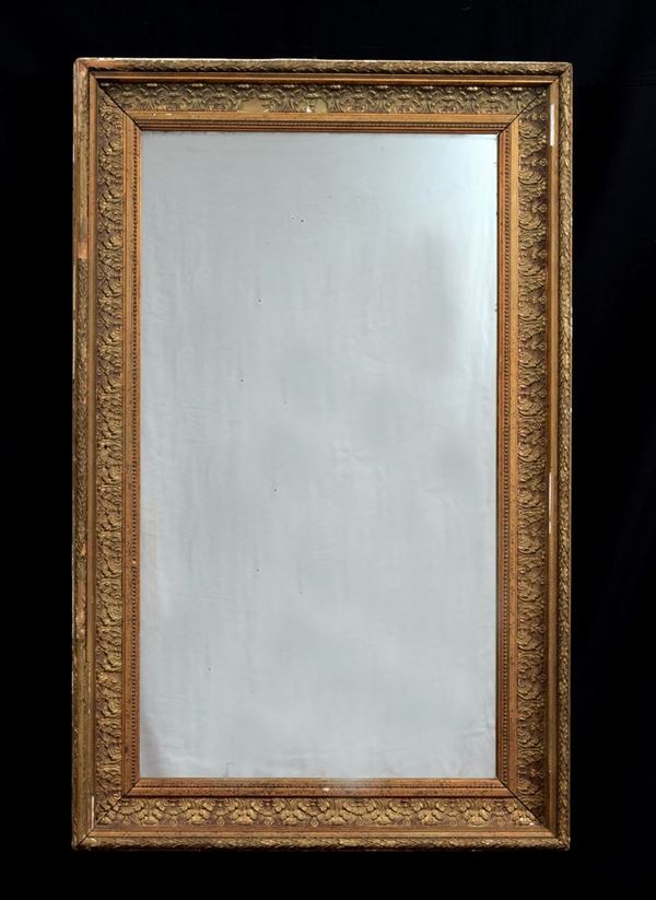 Antique French frame in gilded wood with mirror inside