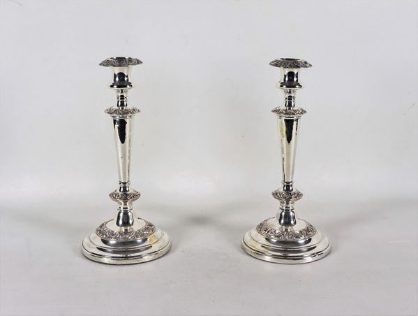 Pair of chiseled and embossed Sheffield candlesticks with floral intertwining motifs