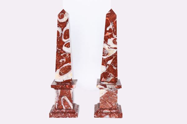 Pair of obelisks in red brecciated marble