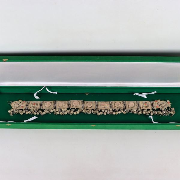 Large ceremony belt, Emirate of Qatar, in silver with applications of coins and rattles of various shapes gr. 600