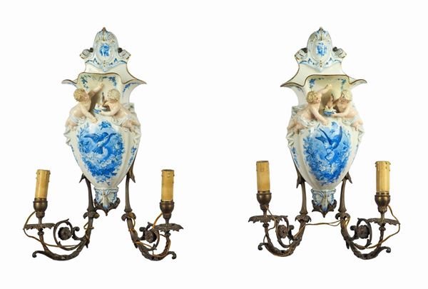 Pair of antique appliques in polychrome Capodimonte porcelain and bronze