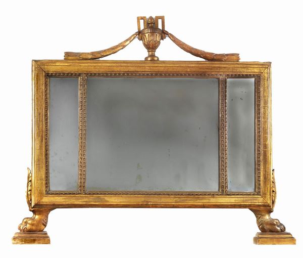 Antique Lucca fireplace in gilded wood carved with laurel leaves, amphora and lion feet, mercury mirror