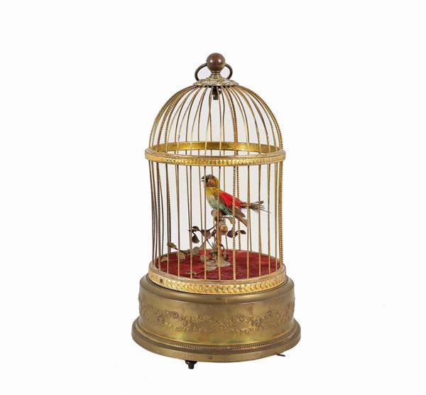 French cage with automaton bird and music box in gilded metal, chiseled and embossed with Louis XVI motifs