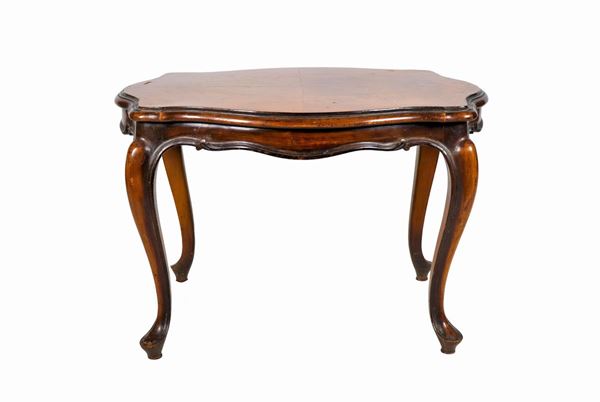 Oval coffee table in walnut