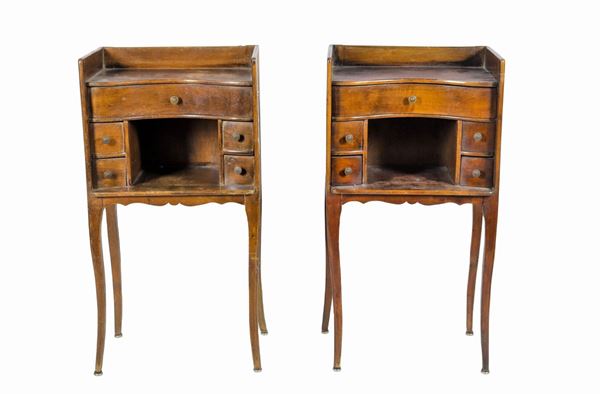 Pair of rectangular mahogany bedside tables with arched tops