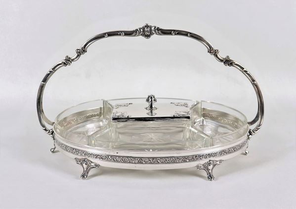 Oval hors d'oeuvre dish in embossed and chiseled silver metal with central butter dish and four crystal bowls
