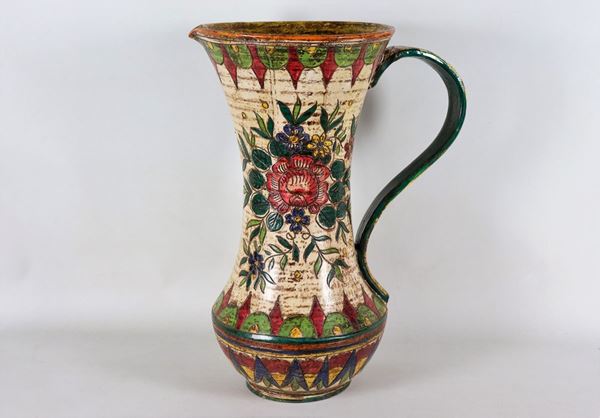 Umbrella stand in the shape of a large jug, in majolica and polychrome ceramic with floral motifs