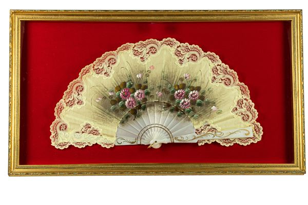 Fan decorated with floral motifs