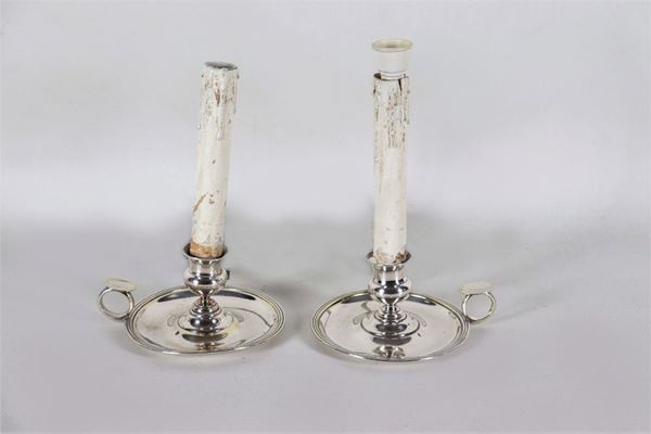 Coppia di bugie in argento con riduzione a luce elettrica, gr. 180 circa