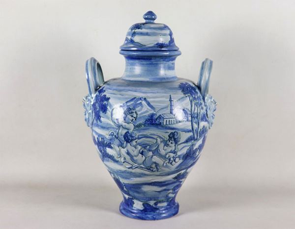 Amphora with lid in majolica from Pesaro, with blue decorations with landscape motifs and allegories of cherubs