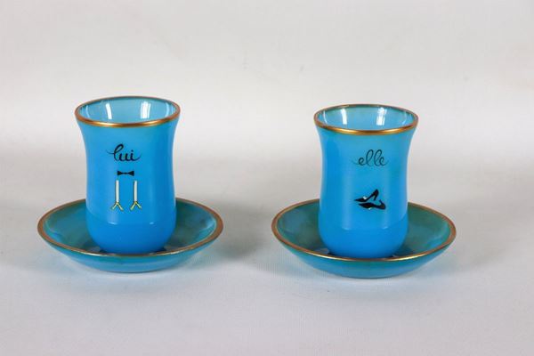 Pair of glasses with saucers "He and She", in light blue opaline with pure gold edges