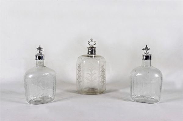 Lot of three small Liberty bottles in blown and engraved glass, necks and caps in silver-plated metal