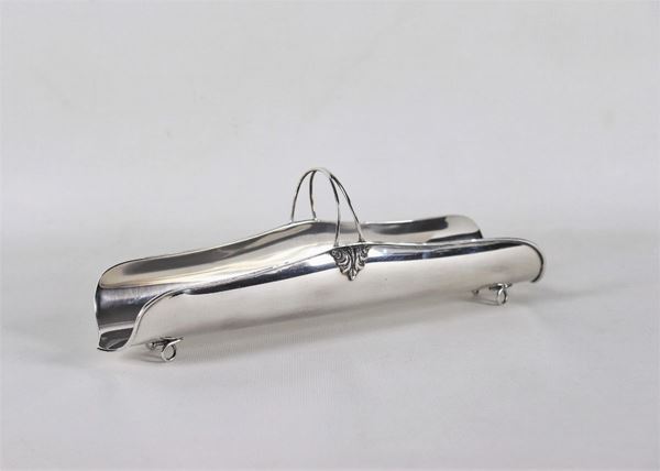 Portagrissini in argento con manico, sorretto da quattro piedini a cerchio, gr. 230