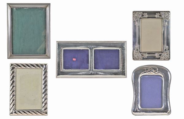 Lot of five picture frames in chiseled and embossed silver