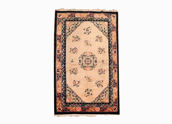 Chinese carpet with geometric motifs on a havana background and blue edges, 2.45 x 1.50 m
