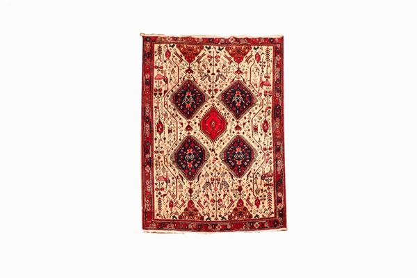 Persian Kazak carpet with geometric motifs on a brown background, 2.18 x 1.65 m