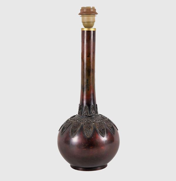Oriental flask vase in bronze, with embossed relief decorations