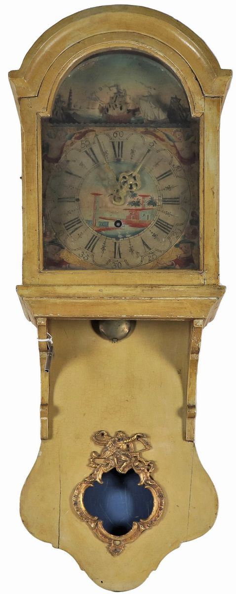 Antique wall clock in lacquered wood, with decorated and painted dial surmounted by a crescent with automatons of sailing ships in the port