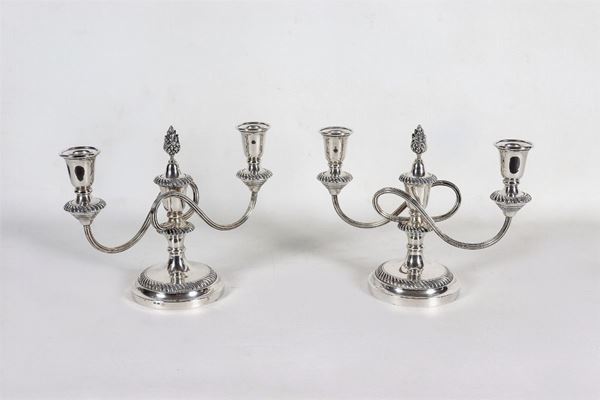 Pair of chiseled and embossed silver candelabra with twisted arms, two flames each, gr. 1090