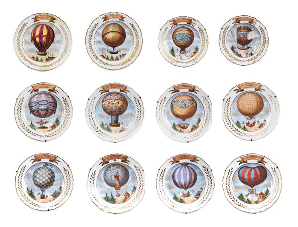 Lot of twelve antique French ornamental plates in Sinceny porcelain, painted with recurrences of various balloon ascents between 1783 and 1810