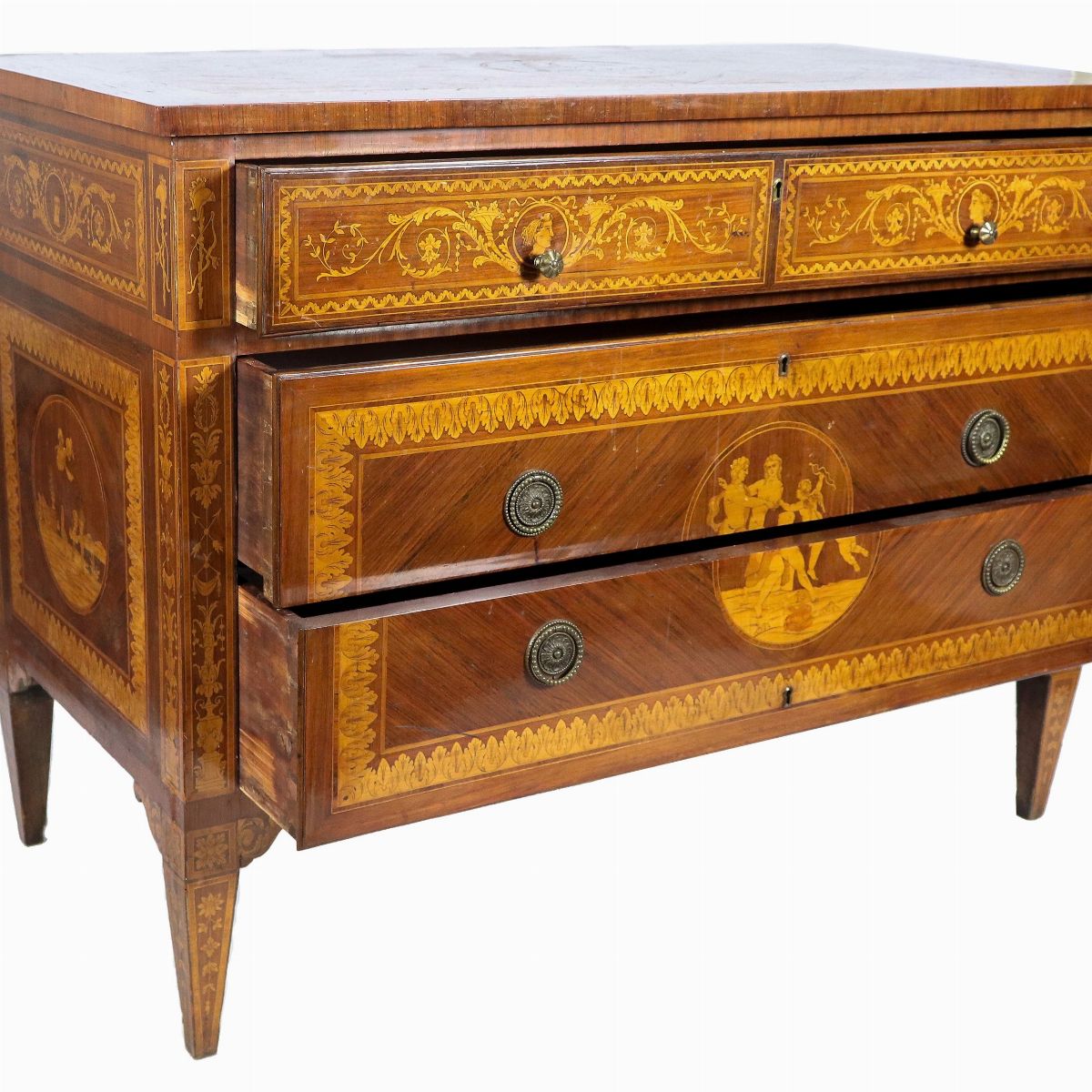 Cassettone Lombardo di linea Luigi XVI in noce, ebano viola e bois de rose, con intarsi neoclassi...