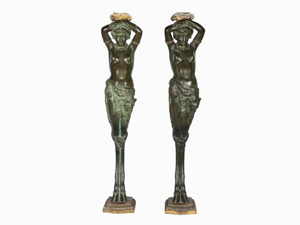 Coppia di sculture in bronzo con capitelli dorati "Cariatidi"