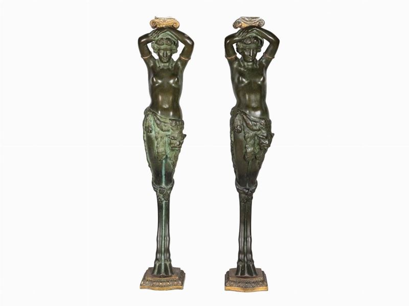 Coppia di sculture in bronzo con capitelli dorati "Cariatidi"