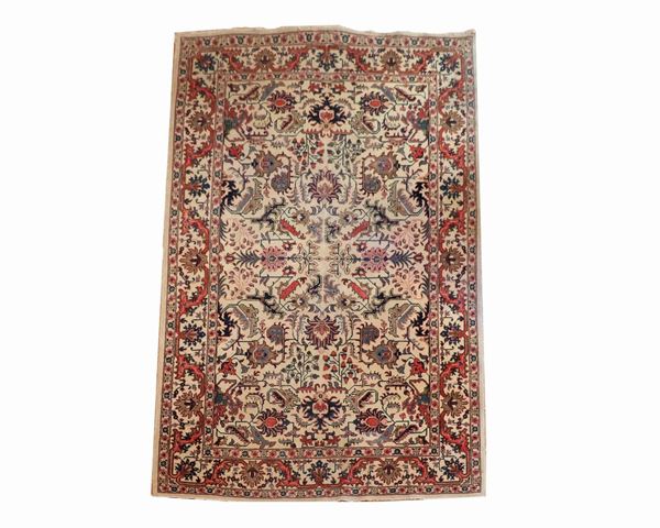 Persian carpet with floral motifs on a havana background, some rapè, 3.02 x 2.03 m