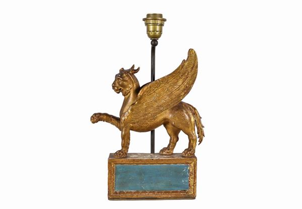Antique sculpture in gilded and lacquered wood "Winged lion"