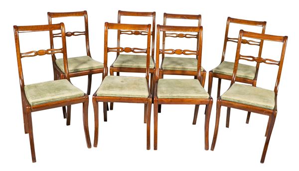 Lot of eight Tuscan chairs in mahogany, with openwork backs and saber legs, cover in light green velvet