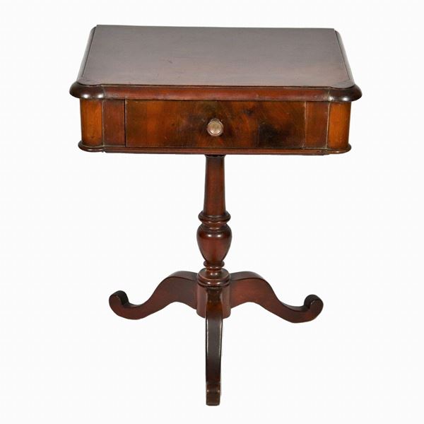 Rectangular wall table in walnut, with central drawer and column base supported by three curved legs