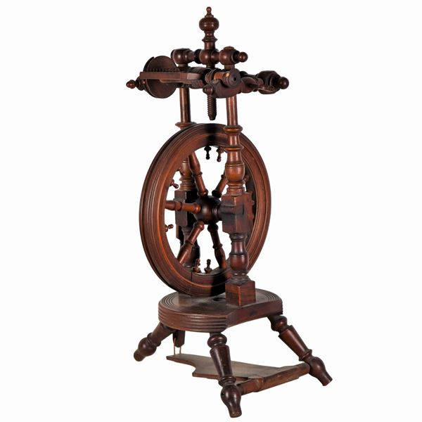 Antique walnut spinning wheel, slight losses