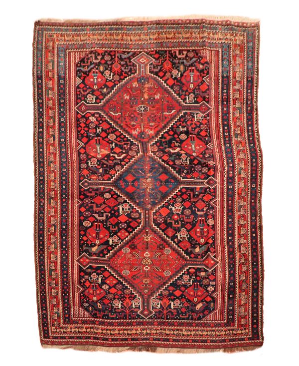 Shiraz carpet with geometric designs on a red and blue background, M. 2.82 x 1.65.