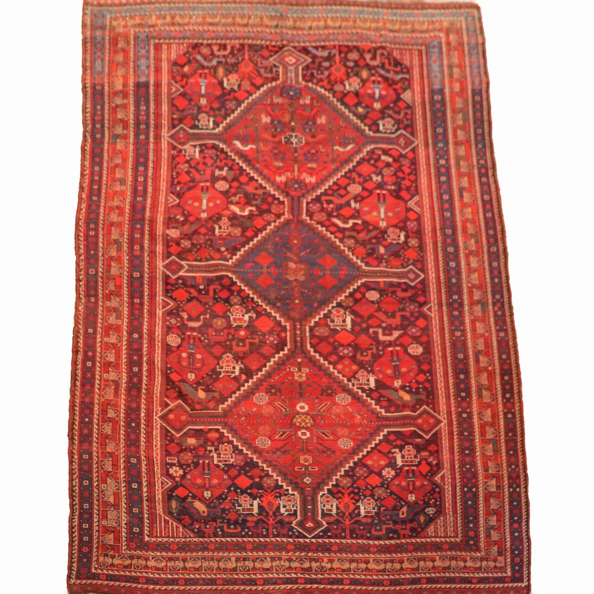 Tappeto Shiraz a disegni geometrici su fondo rosso e blu, M. 2,82 x 1,65.