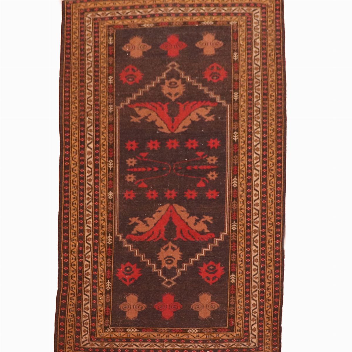 Tappeto persiano a fondo blu e rosso, a disegni geometrici e bordure marroni, M. 1,85 x 0,98.