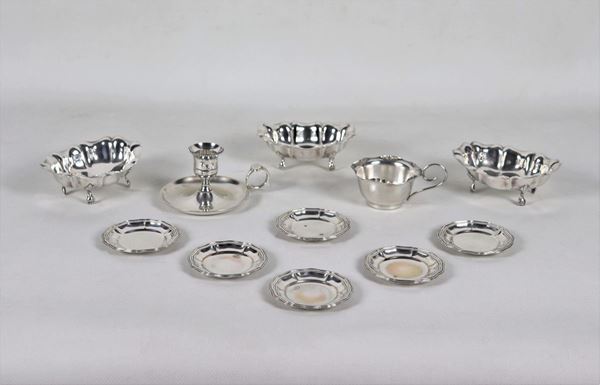 Lot in embossed and chiselled silver metal (11 pcs)