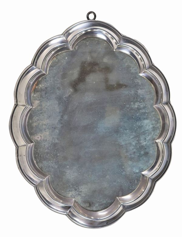 Art nouveau mirror in silver metal with arched edge and mercury mirror